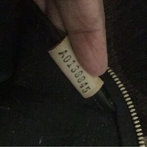Black Zippered Garment